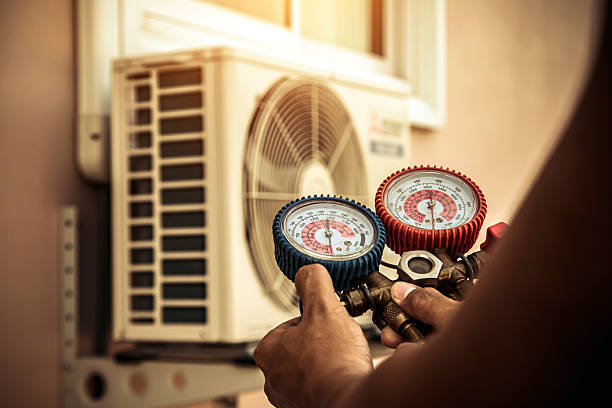 Professional Heat Pump Repair technician working in Martinsburg, OH